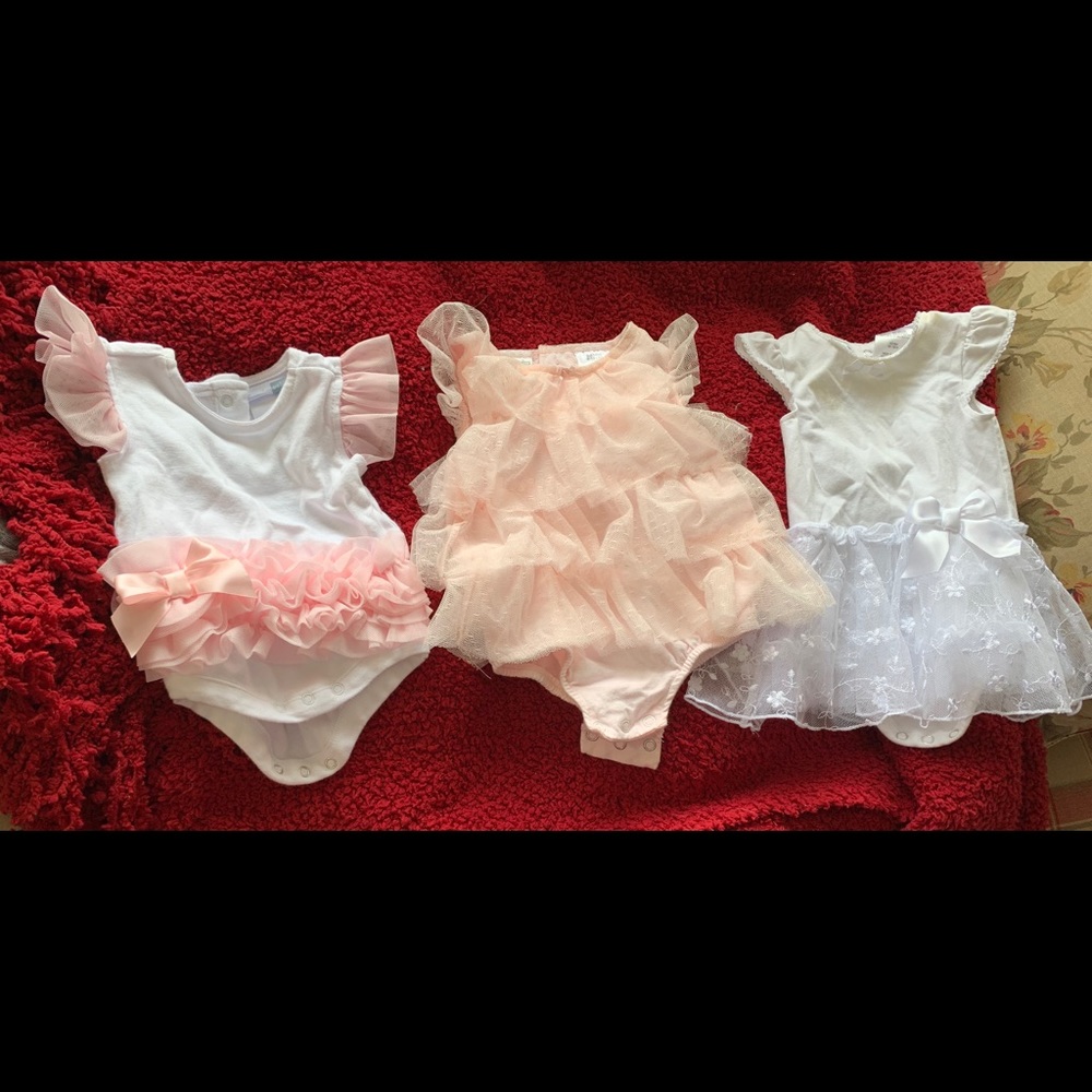Pink and white ruffled onesies